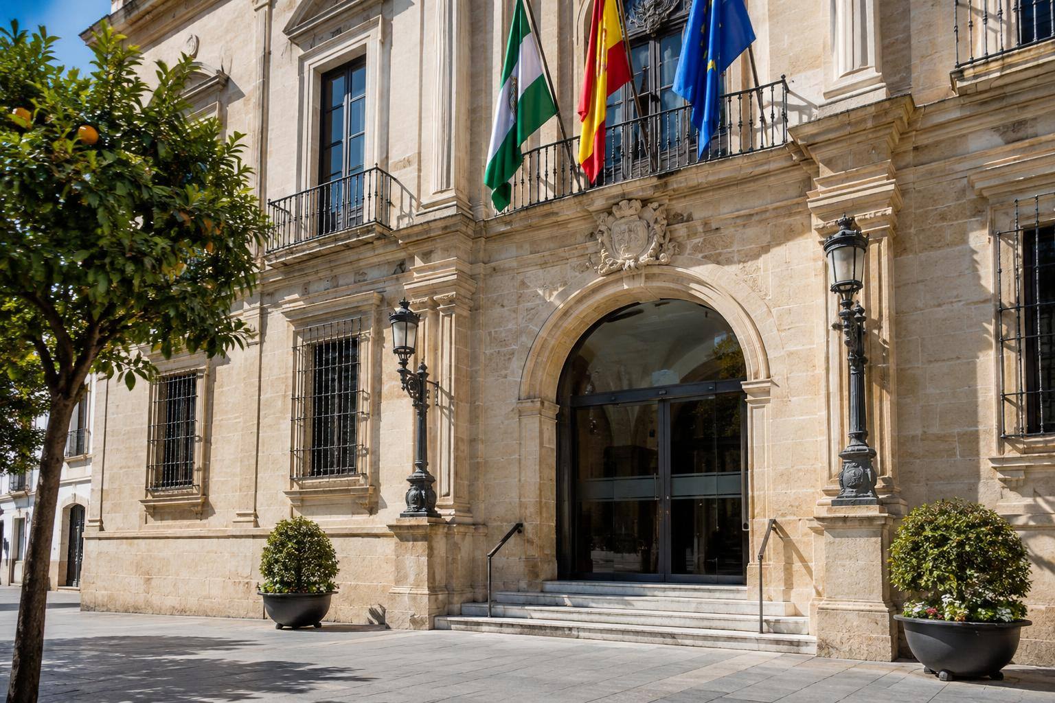 Imagen ilustrativa: Fachada de un edificio municipal con una entrada administrativa, sin personas reconocibles.