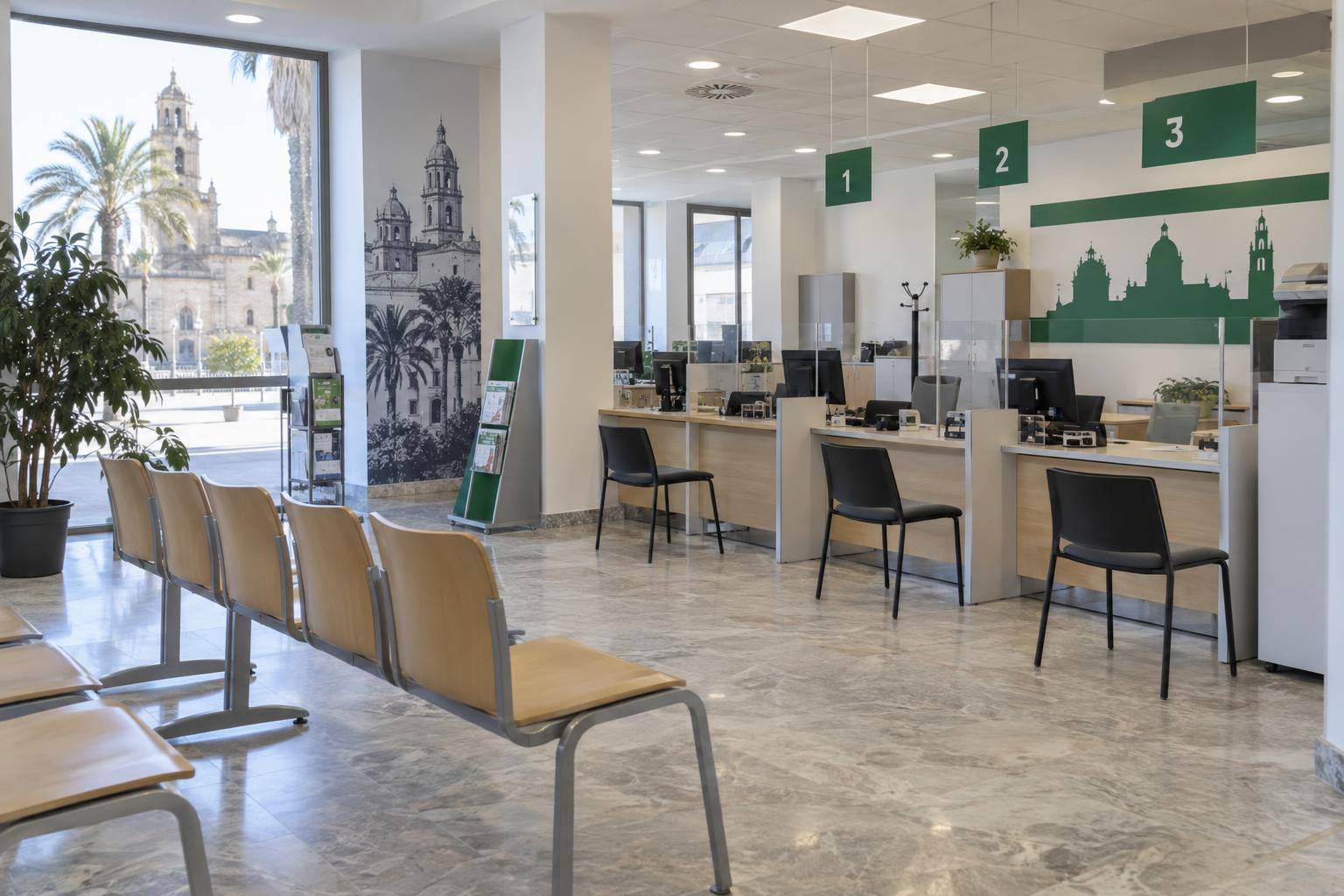 Imagen ilustrativa: Interior de una oficina de empleo con mostradores de atención y una zona de espera, sin personas reconocibles